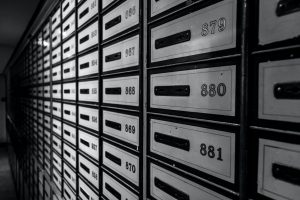 brown steel locker cabinet with padlock