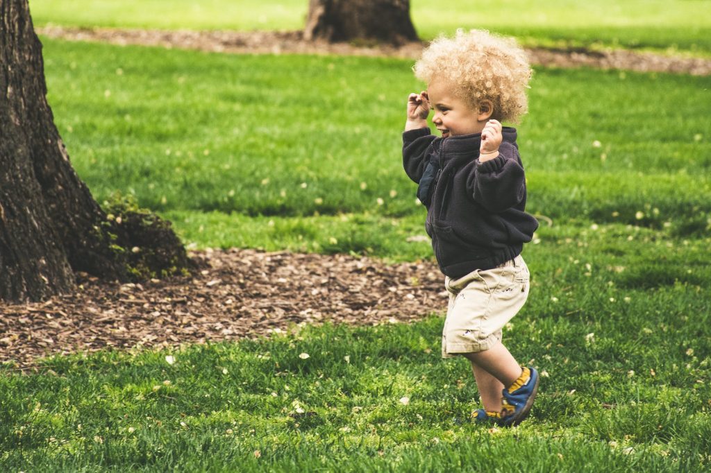 photo of toddler running